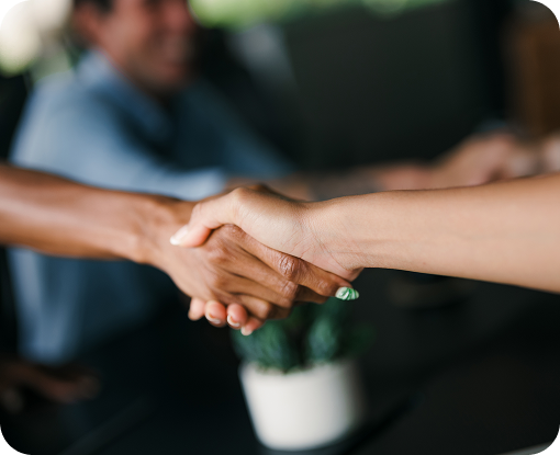 Close-up of two people shaking hands