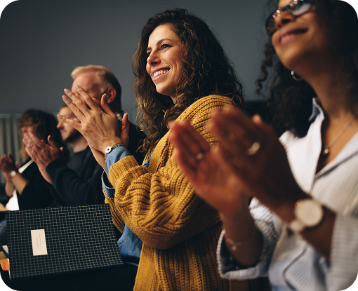 People applauding at a seminar