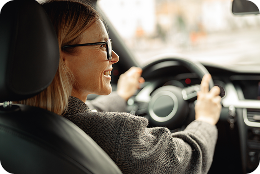 A person driving a car