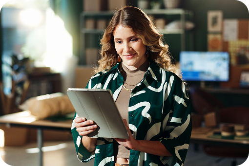 A person using a tablet in an office